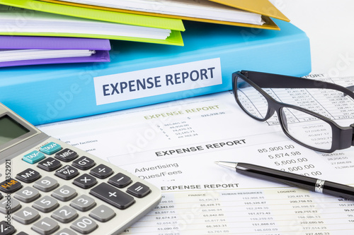 Business expense report with binder