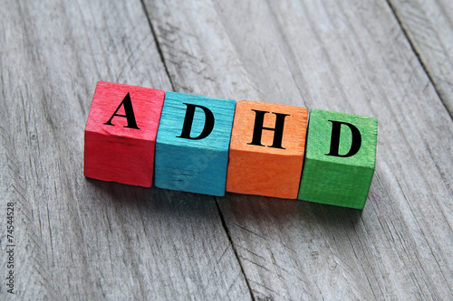 concept of ADHD on colorful wooden cubes