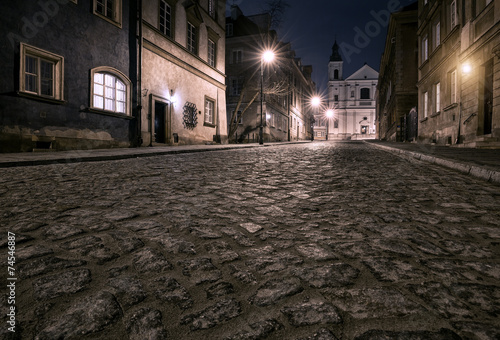 The street of the old town in Warsaw at night