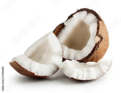 Broken raw ripe coconut