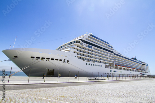 View of a huge cruise ship docked in Lisbon, Portugal.