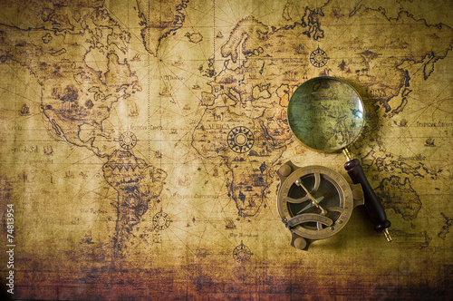 old map with compass and Magnifier