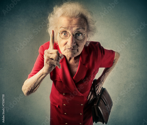 Angry grandma pointing out something