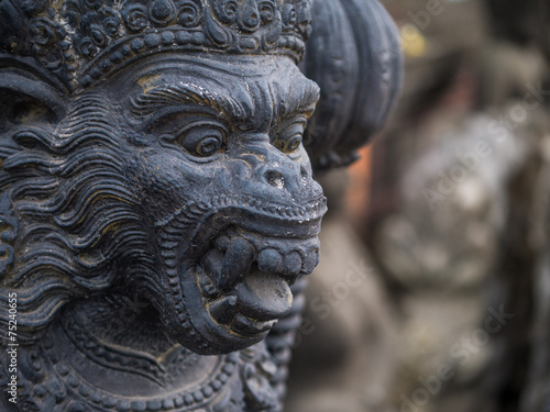 Gardian statue at the Bali temple entrance