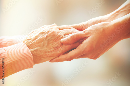 Helping hands, care for the elderly concept