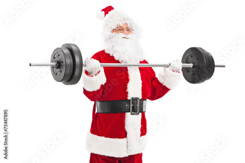 Santa exercising with a heavy barbell