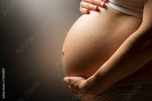 Pregnant woman belly. Pregnancy concept