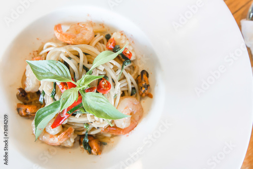 Spicy spaghetti seafood in white dish