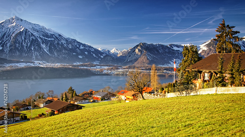Sunshine near Thun lake in Switzerland Alps, Bernese Highland Jungfrau region in winter