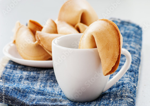 Fortune cookie on a plate close up