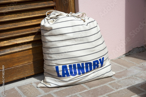 Laundry bag outside a door