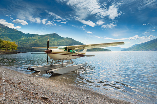 Float plane moored at a beach on Lake Como in Italy, Europe