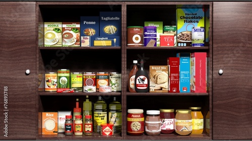 Wooden kitchen cabinet full of food products