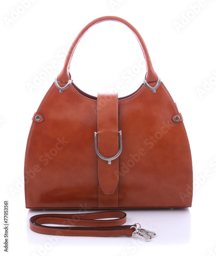 Brown leather handbag on white background