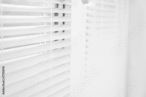 White window with opened blinds