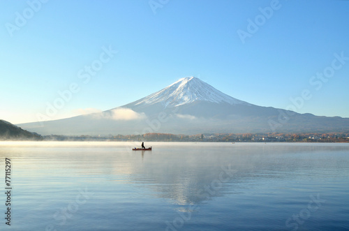 Boat and mount fuji in the morning at kawaguchiko lake japan