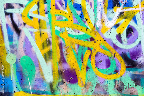 Colorful graffiti wall with spray paint