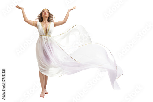 Classical Greek Goddess in Tunic Raising Arms