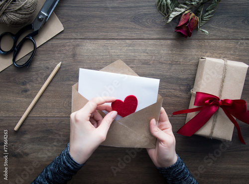 Love letter on wooden background