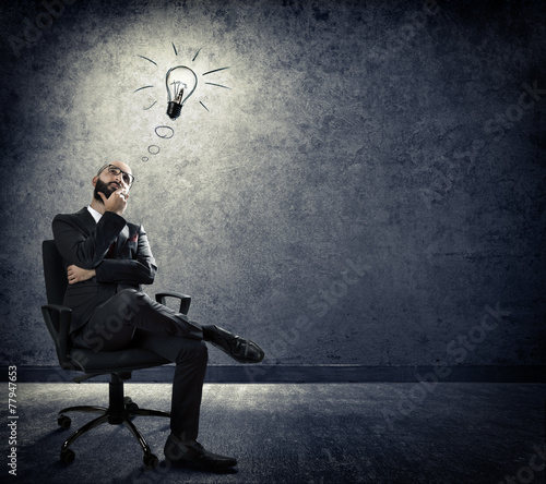 turn on idea - thinking of businessman