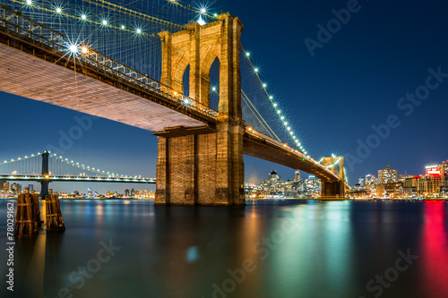 Illuminated Brooklyn Bridge by night