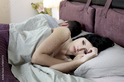 Depressed woman willing to divorce thinking in bed