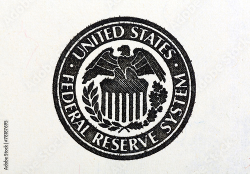 Macro shot of United States Federal Reserve System symbol on old