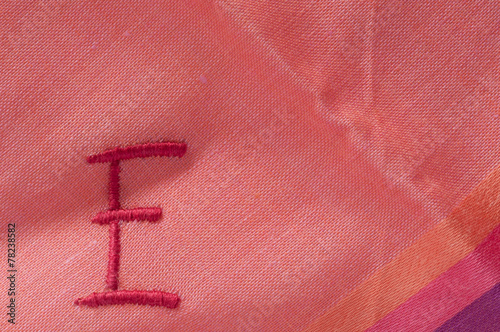 letter E embroidered on a handkerchief