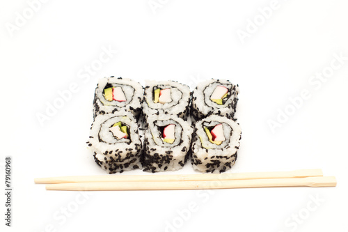 california roll sushi portion of six pieces with surimi, avocado, and sesam on white background