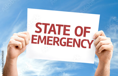 State of Emergency card with sky background