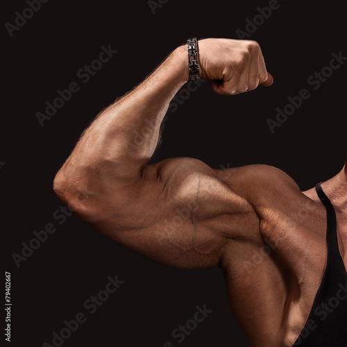 Close up of man's arm showing biceps