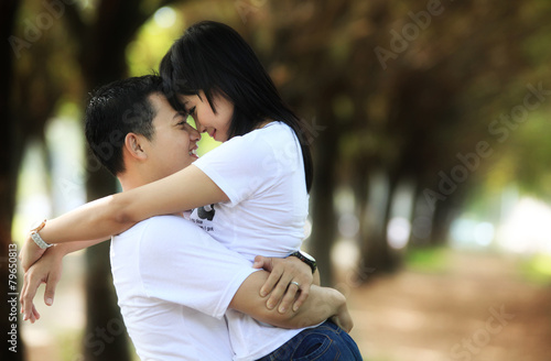 photograph of asian couple outdoor