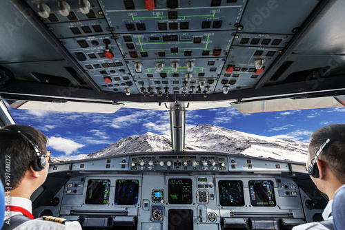 plane cockpit and snow mountain