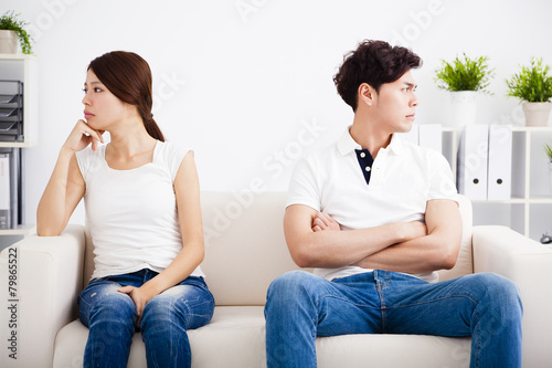young Couple stress and sitting on the sofa