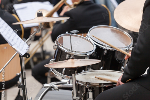 a drummer on the concert. close up process play on a drums