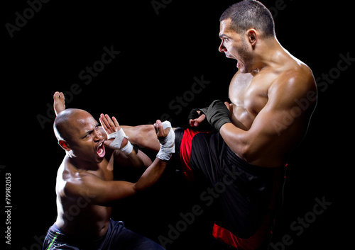 mma fighter performing a counter attack from a kick