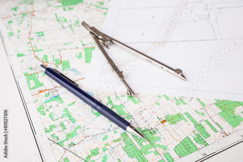 geodesy concept with pencil and calipers