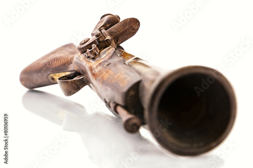 Antique flintlock blunderbuss pistol detail, on white