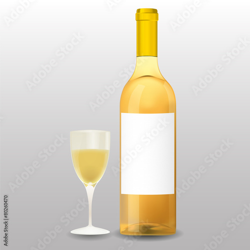 Butelka i lampka białego wina
