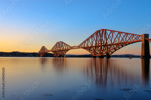 The Forth Rail Bridge in Scotland at sunset