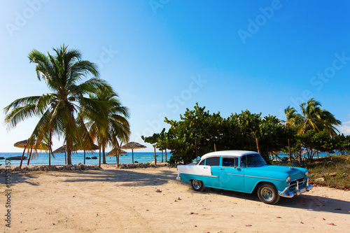 Old classic car on the beach of Cuba