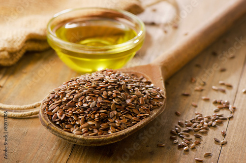 Brown flax seeds on a spoon