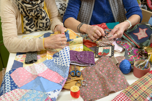 two women working on their quilting