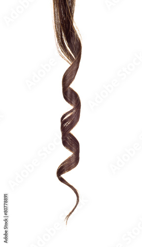 Shiny brown curl isolated on white