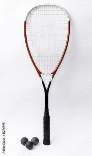 Squash racket isolated on white with balls