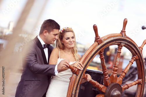 Bride and groom on a boat