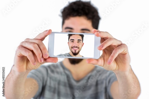 Casual man taking a selfie