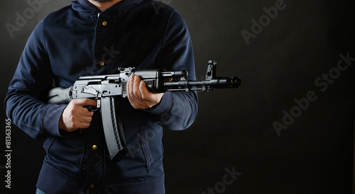 Terrorist is holding AKM 47