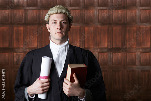 Portrait Of Lawyer In Court Holding Brief And Book