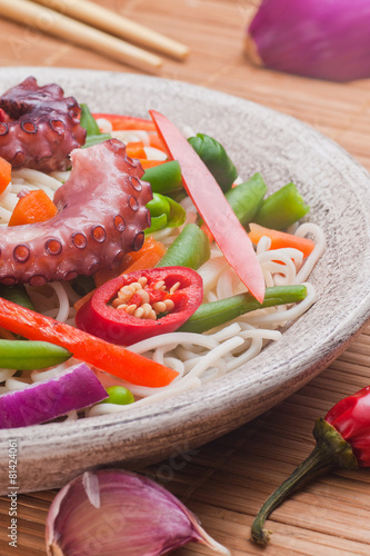 Chinese mix vegetables with pasta and octopus.